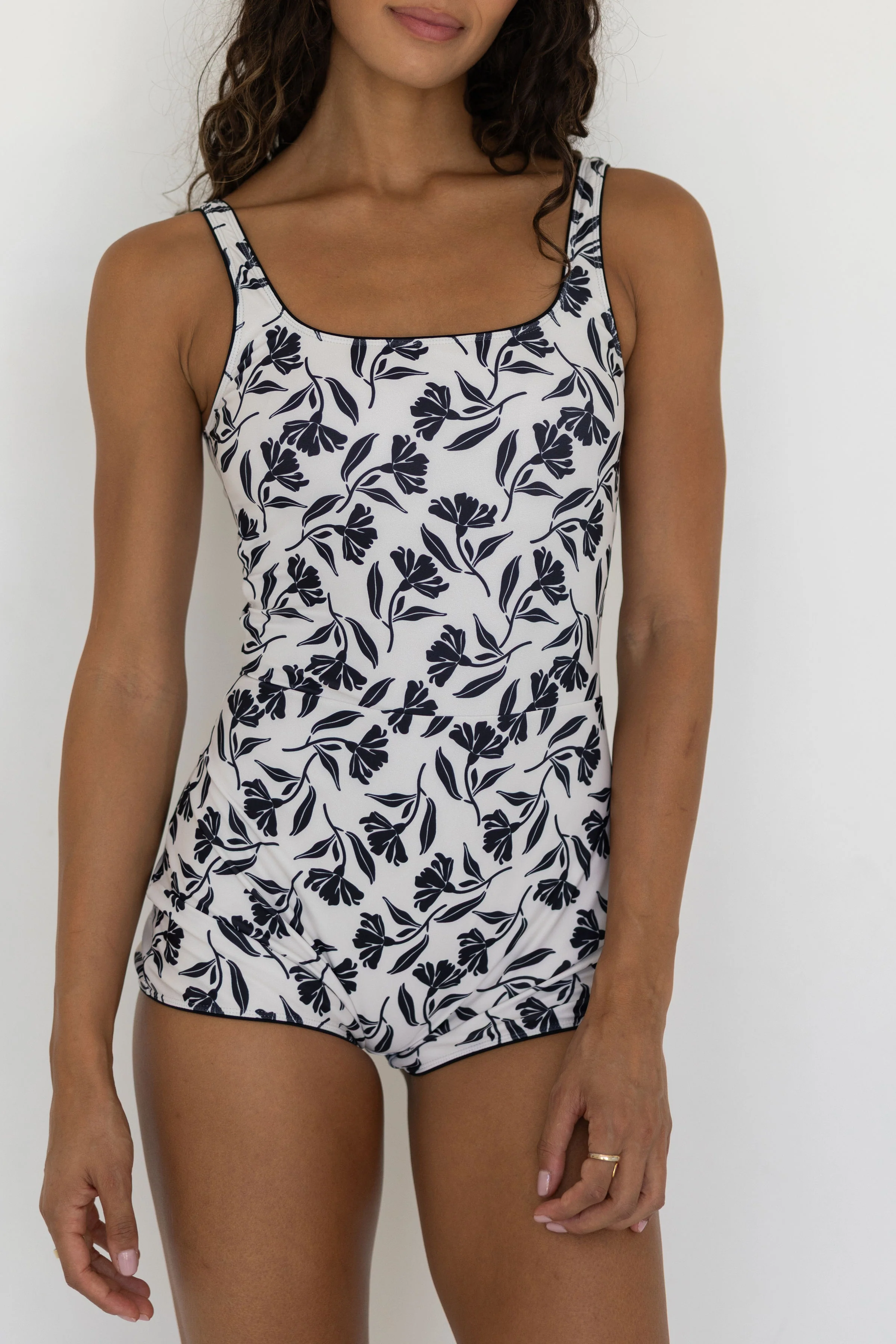 Aruba Bodysuit | White & Black Floral Open Back Swim Bodysuit with Shorts